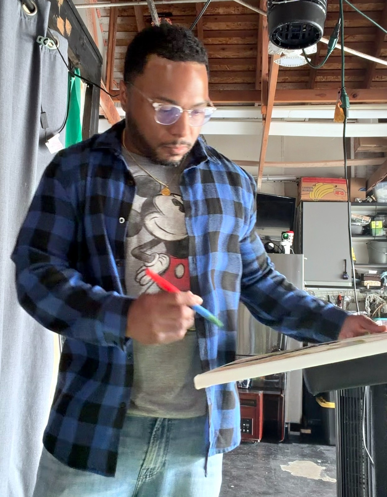 Brandon Tito Bonds drawing in his Oakland studio